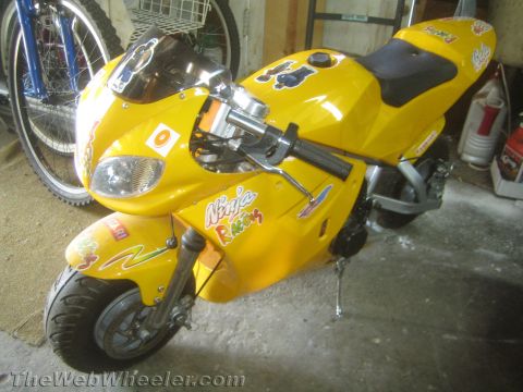 1968 Ford Mustang - This is a yellow pocket bike, not a 1968 Ford Mustang.