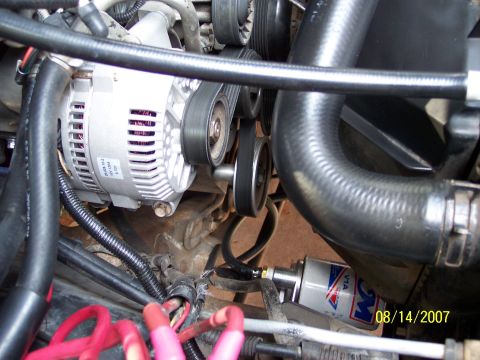 1996 Ford Bronco - The new RJM Injection Tech 3g 160 amp alternator, smog pump delete pulley and B&M remote in-line transmission filter