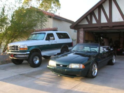 1996 Ford Bronco - 5.8 next to the 5.0