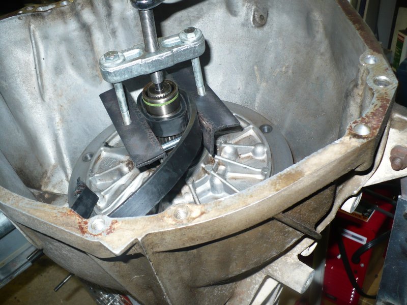 Transmission housing with a tool engaged on internal components