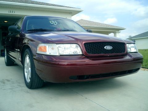 2004 Ford Crown Victoria - Replaced the Factory slotted grille with a grille from the P71 Police issue and painted the outside edges to match the body color Dark Tore…