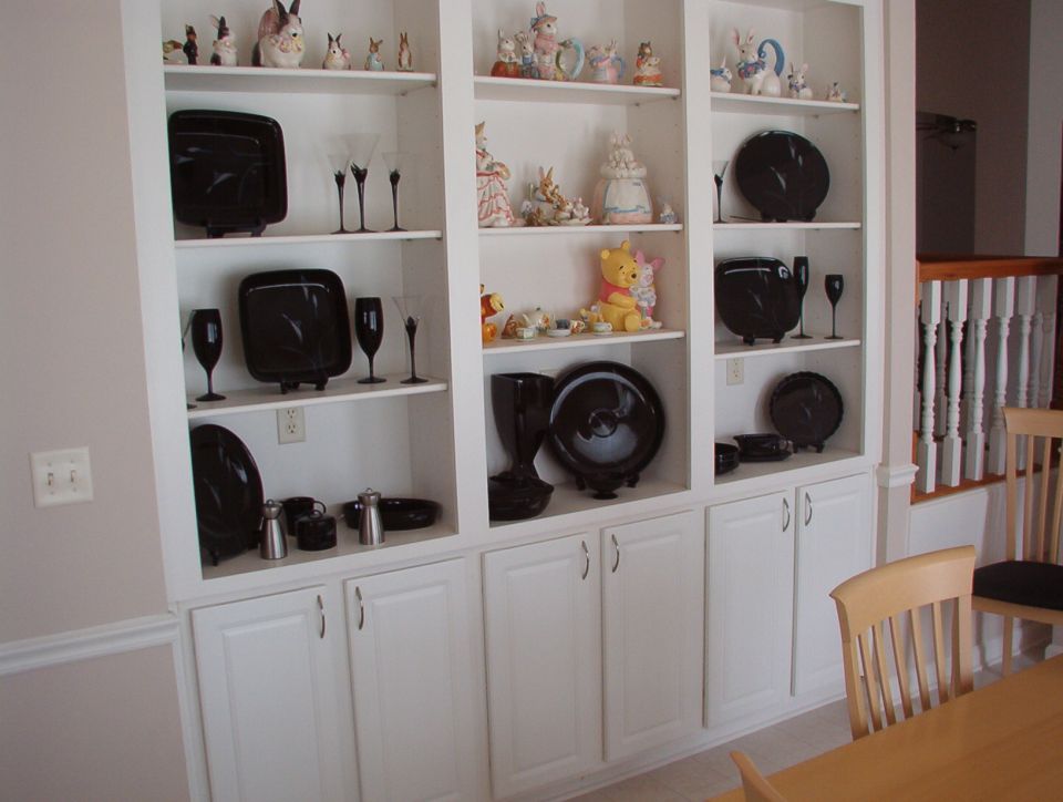 After about 5 years, we picked out some handles for the kitchen cabinets.  We don't like to rush into big decisions...

The china is Mikasa Opus Black.  The stemware is (mostly) Mikasa Elegance Black.  She collects WtP & rabbit figurines.