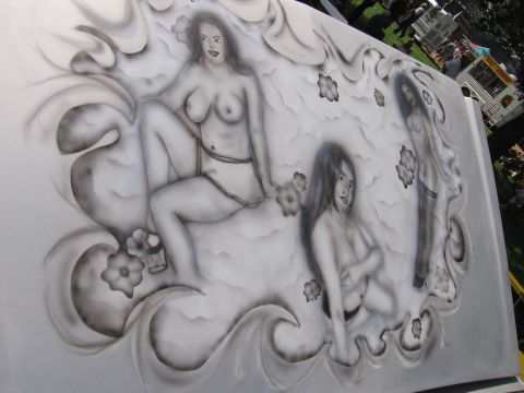 1989 Ford Mustang - This photo shows airbrushed artwork three women on a vehicle panel, with a website address visible at the bottom.