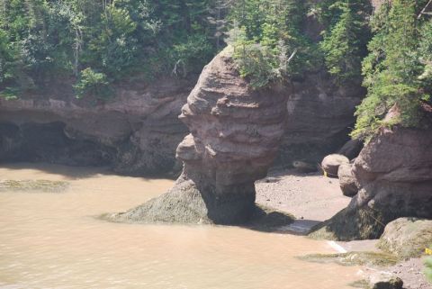1996 Ford Bronco - A natural rock formation at Hopewell Rocks, New Brunswick, Canada, appears to resemble a face.