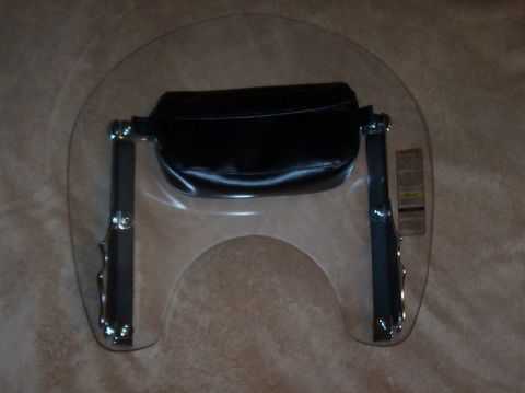 1994 Ford F-150 - A motorcycle windshield and bag assembly is shown against a textured background.