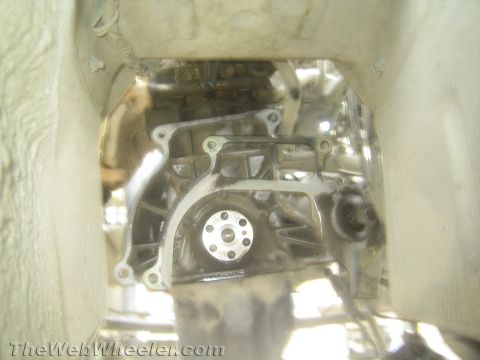 1987 Suzuki Samurai - Close-up view of an engine transmission bell housing, likely during a swap or repair.