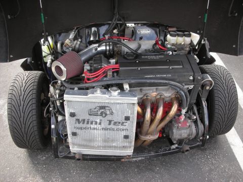 1998 Ford Crown Victoria - Custom vehicle engine bay a Honda DOHC VTEC engine and aftermarket parts.