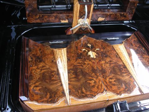 1998 Ford Crown Victoria - The trunk interior features intricate wood paneling and a visible Rockford Fosgate logo.