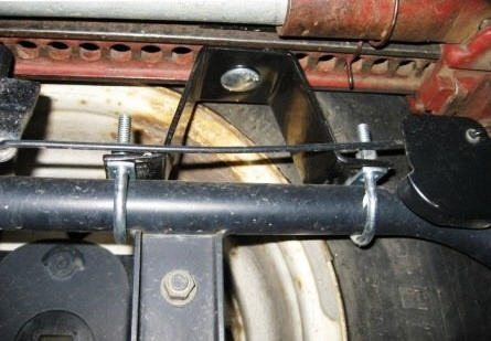 1995 Ford Bronco - Undercarriage view of a hi-lift jack mount and hardware.