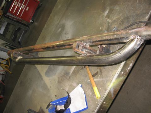 1991 Ford Bronco - Custom metal tubing assembly, likely a bumper or frame component, undergoing fabrication.