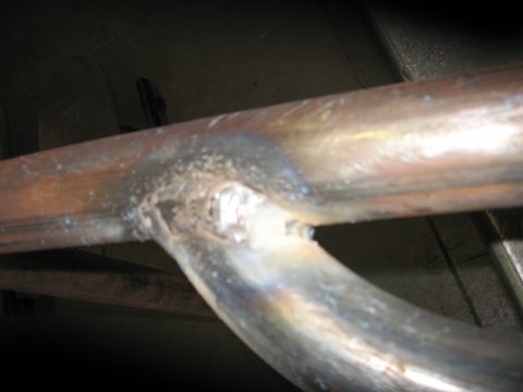 1991 Ford Bronco - This image shows a close-up view of welded metal tubing, possibly a custom fabricated part.