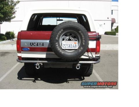 1991 Ford Bronco - Rear view of a 1991 Ford Bronco showing the spare tire and custom bumper.