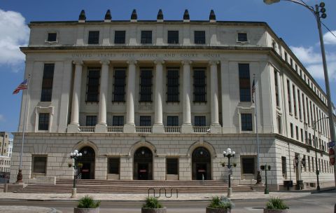 1997 Ford Probe - Exterior view of the United States Post Office and Court House building on a sunny day.