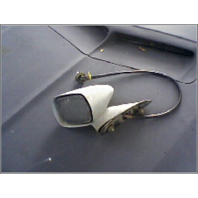 1973 Ford Ranchero - Side mirror assembly with attached cable, likely a replacement part.
