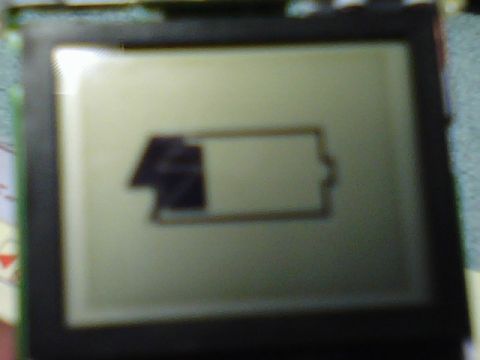 1984 Ford Bronco - A screen displays a battery icon with a low charge level.