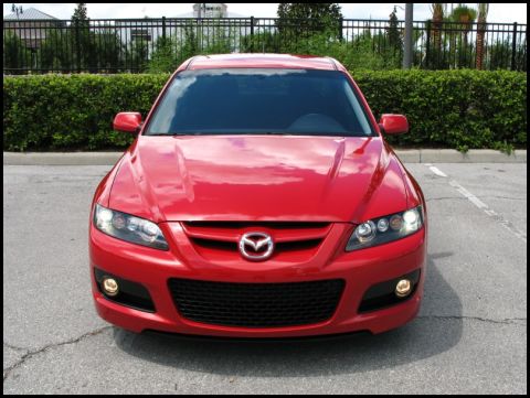 2006 Mazda 6 - Front view of a red 2006 Mazda 6 sedan parked outdoors.