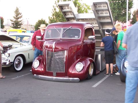 1990 Ford Bronco - Customized International Harvester truck on display at an outdoor car show event.