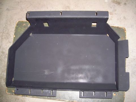 2003 Jeep TJ - A black metal skid plate is shown, likely an aftermarket part for an off-road vehicle.
