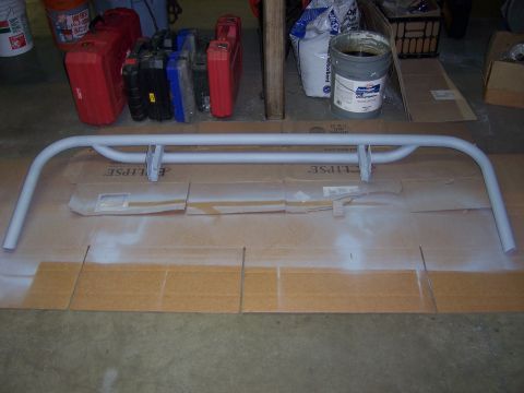 1991 Ford Bronco - Custom tubular rear bumper, likely for an SUV, undergoing preparation or painting.