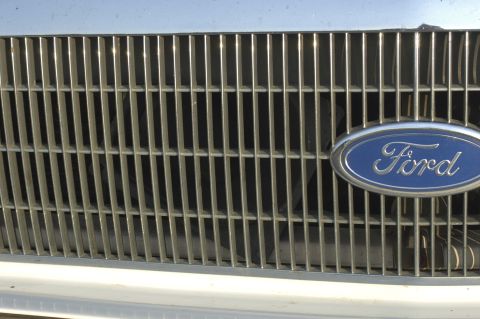 1991 Ford Crown Victoria LTD - Close-up of the 1991 Ford Crown Victoria LTD's front grille and Ford emblem.