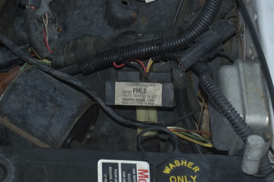 Headlight flasher module labeled FHL2, Federal Signal Corp, assembled in Mexico