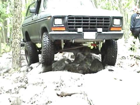 1978 Ford Bronco - This 1978 Ford Bronco is shown navigating a rocky trail with its front end prominently displayed.