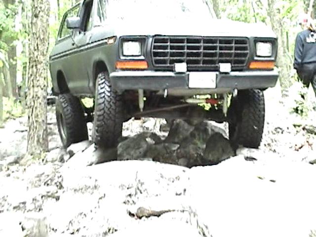 1978 Ford Bronco front grille and tires on rocks