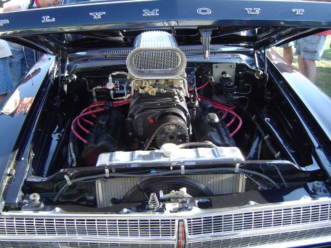 1964 Ford Fairlane - Engine bay view of a V8 with a prominent supercharger and BDS branding.