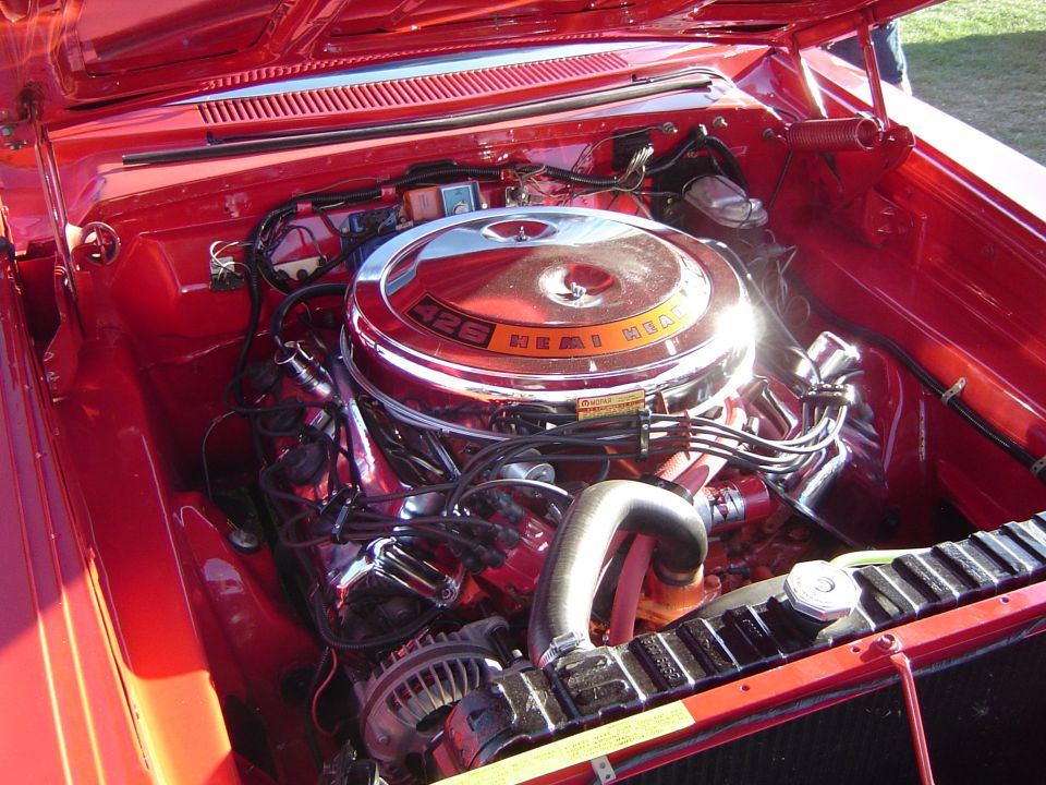 Engine bay with a chrome air cleaner labeled 426 Hemi