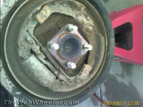 1987 Suzuki Samurai - The photo shows a close-up view of a vehicle's drum brake assembly, which appears to be in a state of disrepair.