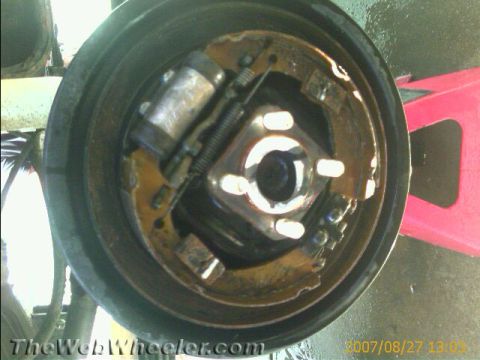 1987 Suzuki Samurai - Close-up of a vehicle's brake drum assembly, showing internal components.