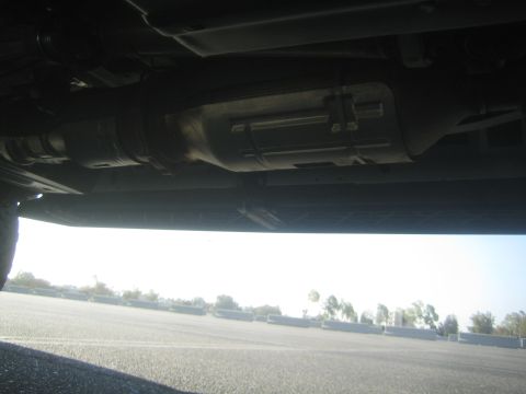 1968 Ford Mustang - The underside of a vehicle is visible, showing the exhaust system and frame components.