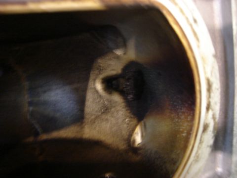 2000 Ford Crown Victoria - Close-up view of an engine cylinder, showing internal wear and carbon deposits.