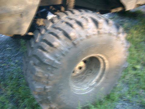 1991 Chevrolet Suburban - Off-road tire and suspension detail, likely from a truck or SUV.