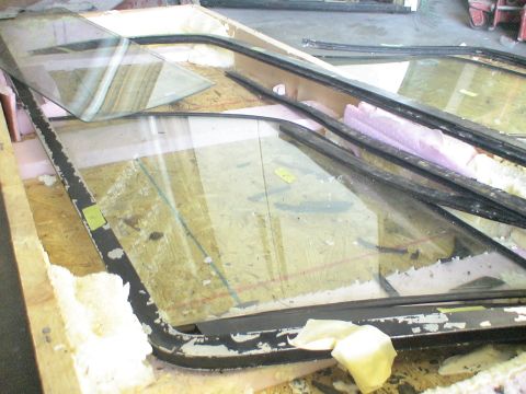 1993 Ford C-350 (Centurion Conversions) - Vehicle windows packed for transport, possibly for a Ford C-350 Centurion Conversions.