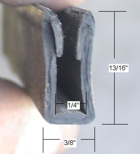 1993 Ford C-350 (Centurion Conversions) - Close-up of a rubber seal profile, showing its dimensions for identification purposes of a part.