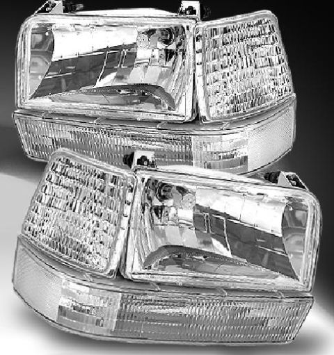 1990 Ford Bronco - Pair of aftermarket headlights for a Ford Bronco, possibly from the 1990s.