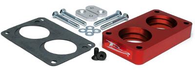 1990 Ford Bronco - A red throttle body spacer kit, including a gasket and mounting hardware, is displayed against a white background.