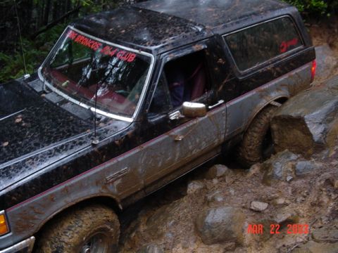 1989 Ford Bronco - Rear going by the rock