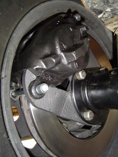 1978 Ford Bronco - Rear brake assembly detail showing caliper, rotor, and mounting bracket.