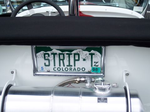 1972 Ford Ranchero - A custom Colorado license plate is mounted on a vehicle, showing the mountains and the plate number STRIP-T.
