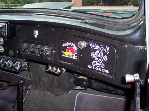 1972 Ford Ranchero - The interior dashboard features custom stickers, including 'Prime Evil Rod & Gun Club' and a Road Runner graphic.