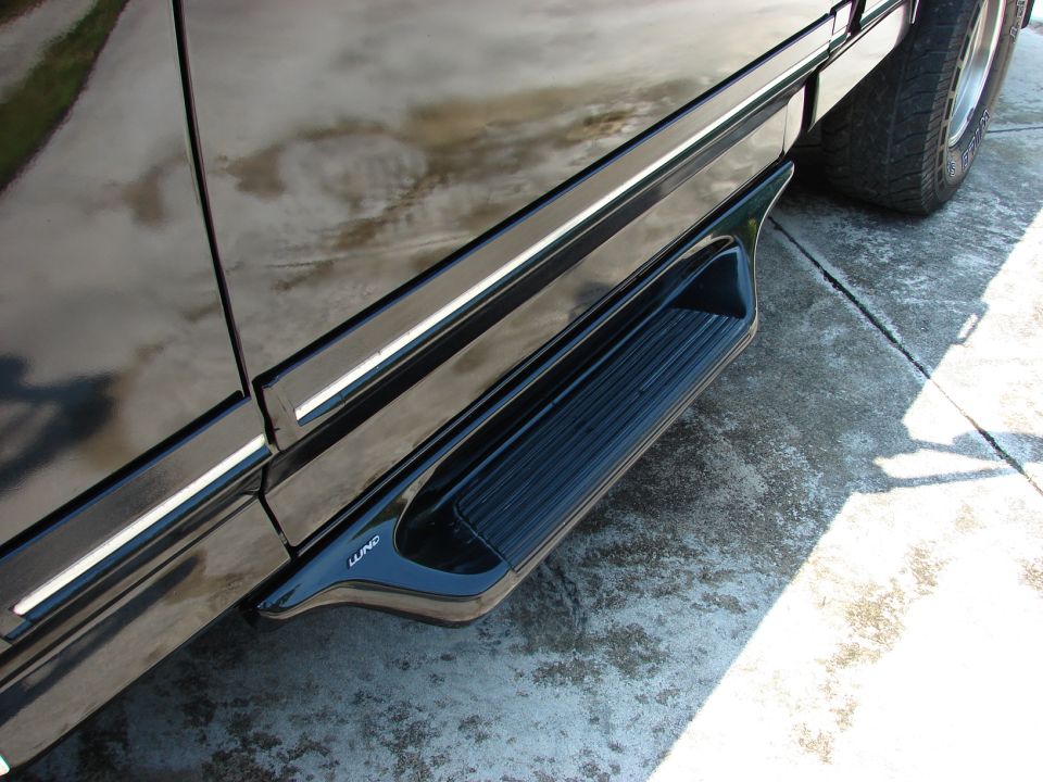 Black truck side step with LUND logo