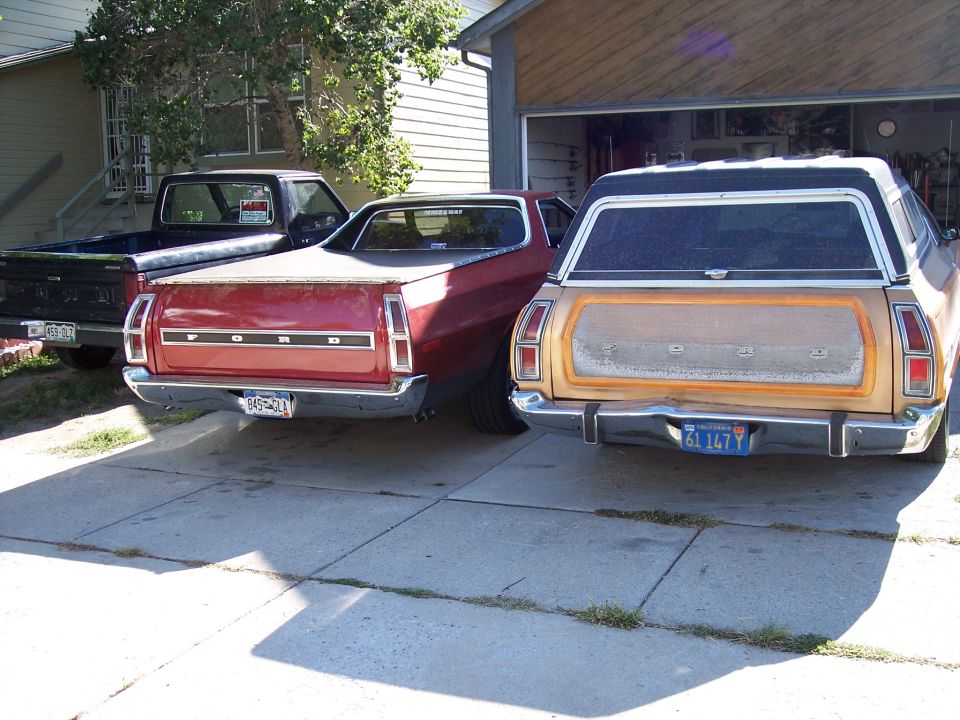 Red Ford Ranchero and tan Ford wagon parked next to black pickup truck in driveway