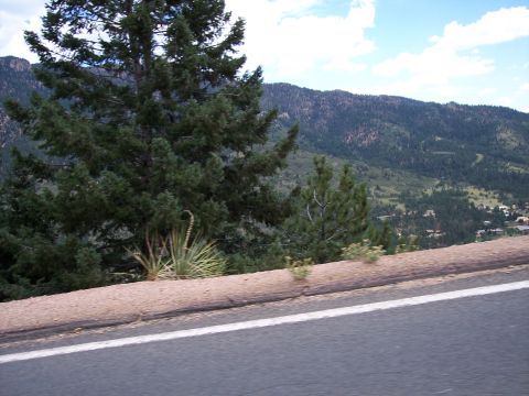 1972 Ford Ranchero - A scenic view of mountains and trees from a roadside perspective.