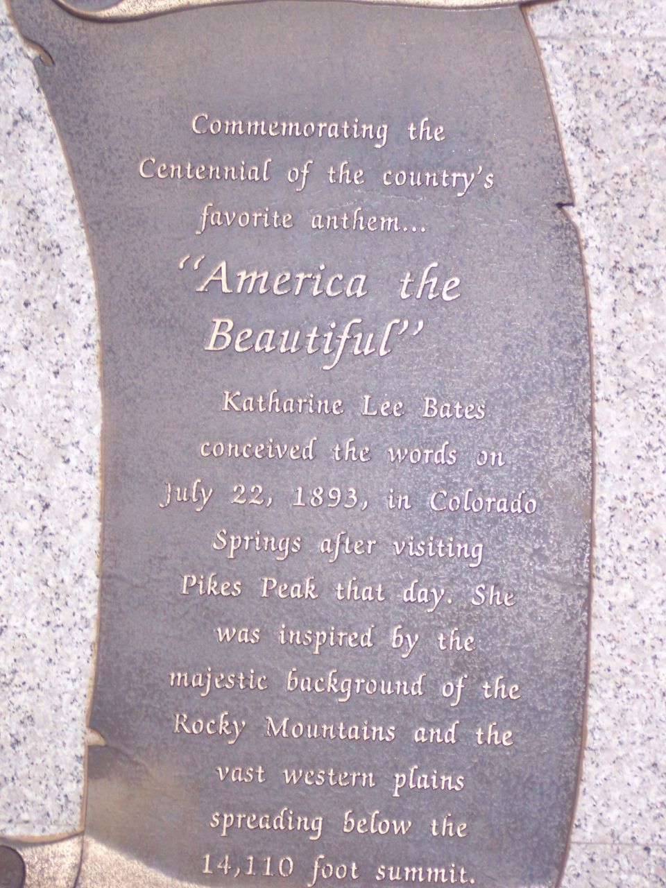 Bronze scroll plaque commemorating the centennial of America the Beautiful