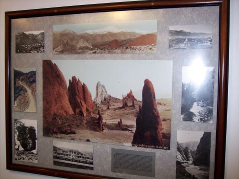 1972 Ford Ranchero - A framed display features multiple vintage photographs, including landscapes and a historical building, likely from the Pikes Peak region.