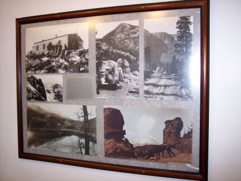 1972 Ford Ranchero - Framed historical photographs depict mountain scenes, a building, and a lake with reflections.