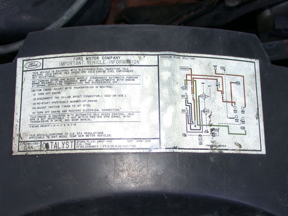 1987 Ford 5.0L emission decal with tune-up instructions and vacuum hose routing diagram