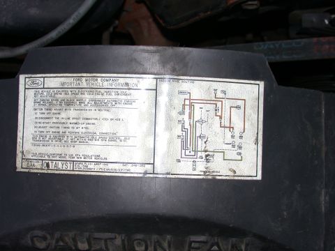 1987 Lincoln Town Car - A sticker on a black surface provides important vehicle information and a vacuum hose routing diagram.